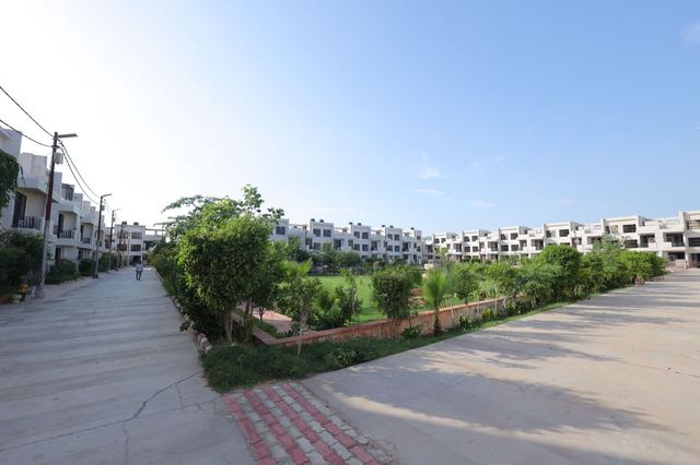 Villa row with landscaped garden